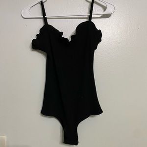 Black ruffled body suit